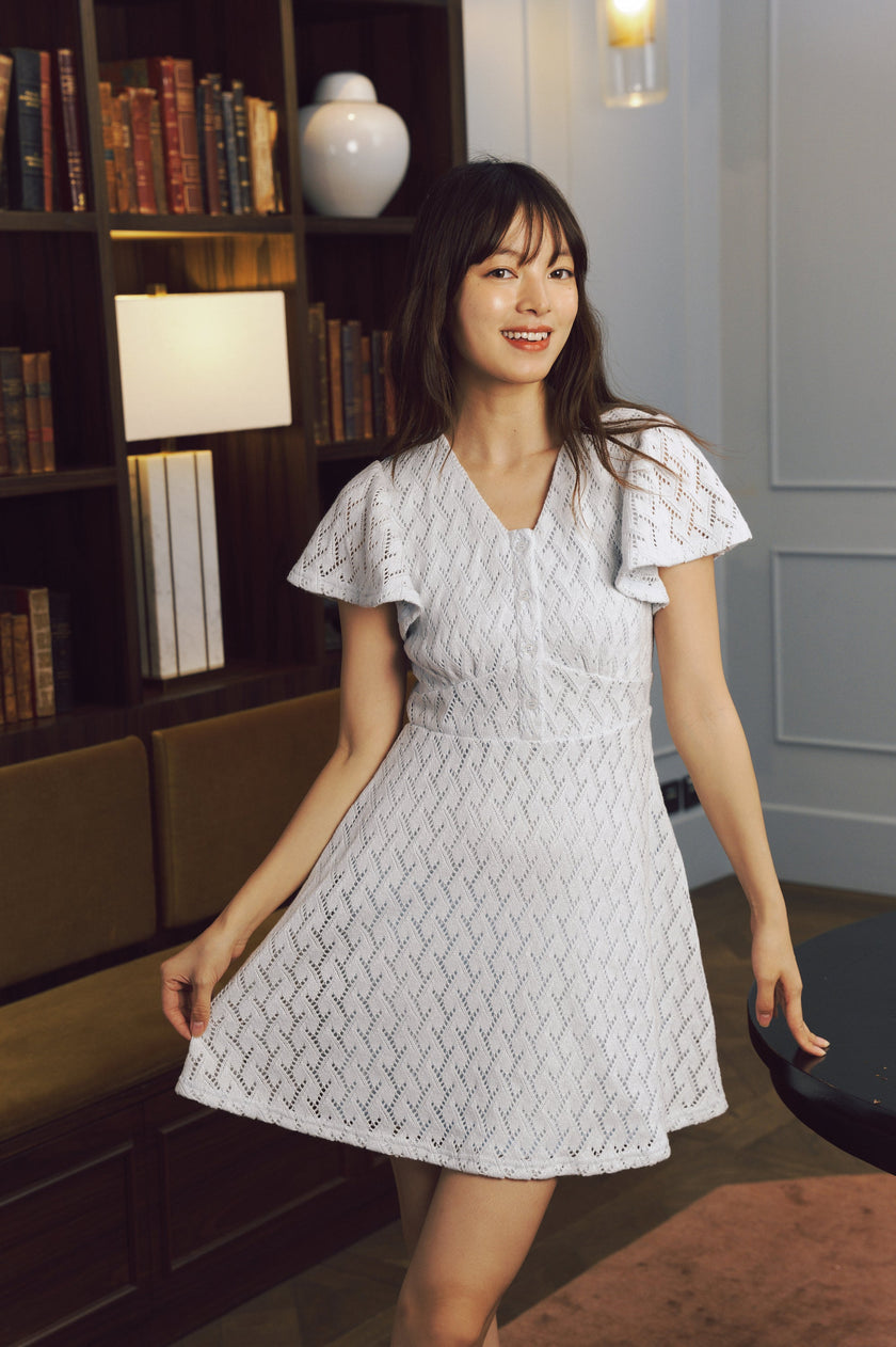 Chic White Geometric Knit Mini Dress